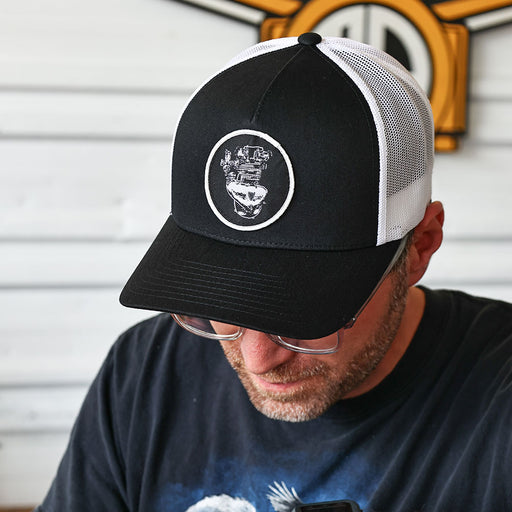 Preunit Triumph Woven Patch Hat- Black/White
This hat features the Preunit Triumph motor on a Black/White YP Classics 5 panel retro trucker cap.
Structured 5-Panel
Permacurv Visor, Mid-profile
Sewn in Eau Claire, WI USA