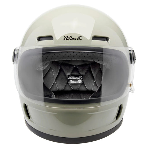 gray motorcycle helmet with clear visor on a white background