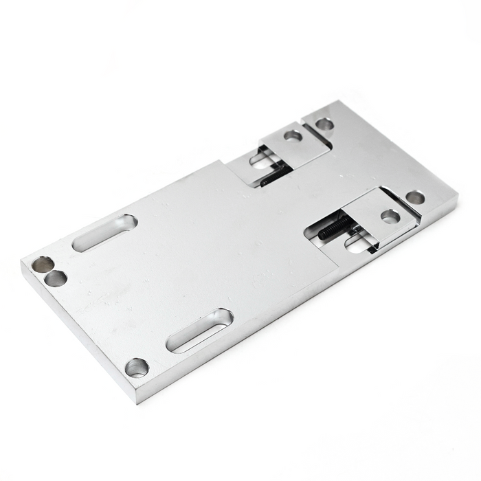 4 Speed Adjustable Transmission Mounting Plate- Chrome

Adjustable transmission mounting plate with a chrome finish features built in adjuster screws for positive and even adjustment.
The built in dual adjusters operate from the end of the 1/2" thick steel plate by counter bored socket head screws. They permit accurate alignment of the mainshaft and are ideal for open belt drive models. The three holes at the front fit various frames. Fits 4-speed Big Twin transmissions from 1979-1986 with flat bottom cases