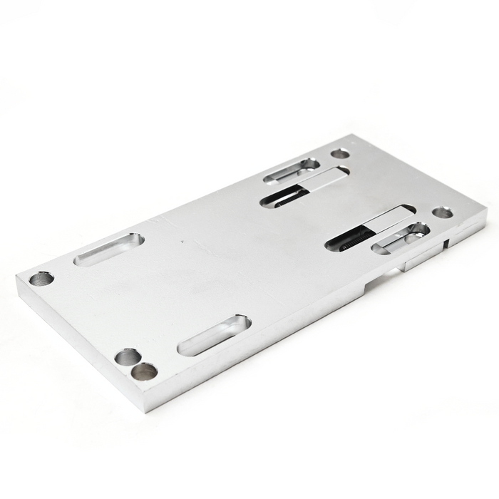 4 Speed Adjustable Transmission Mounting Plate- Chrome

Adjustable transmission mounting plate with a chrome finish features built in adjuster screws for positive and even adjustment.
The built in dual adjusters operate from the end of the 1/2" thick steel plate by counter bored socket head screws. They permit accurate alignment of the mainshaft and are ideal for open belt drive models. The three holes at the front fit various frames. Fits 4-speed Big Twin transmissions from 1979-1986 with flat bottom cases
