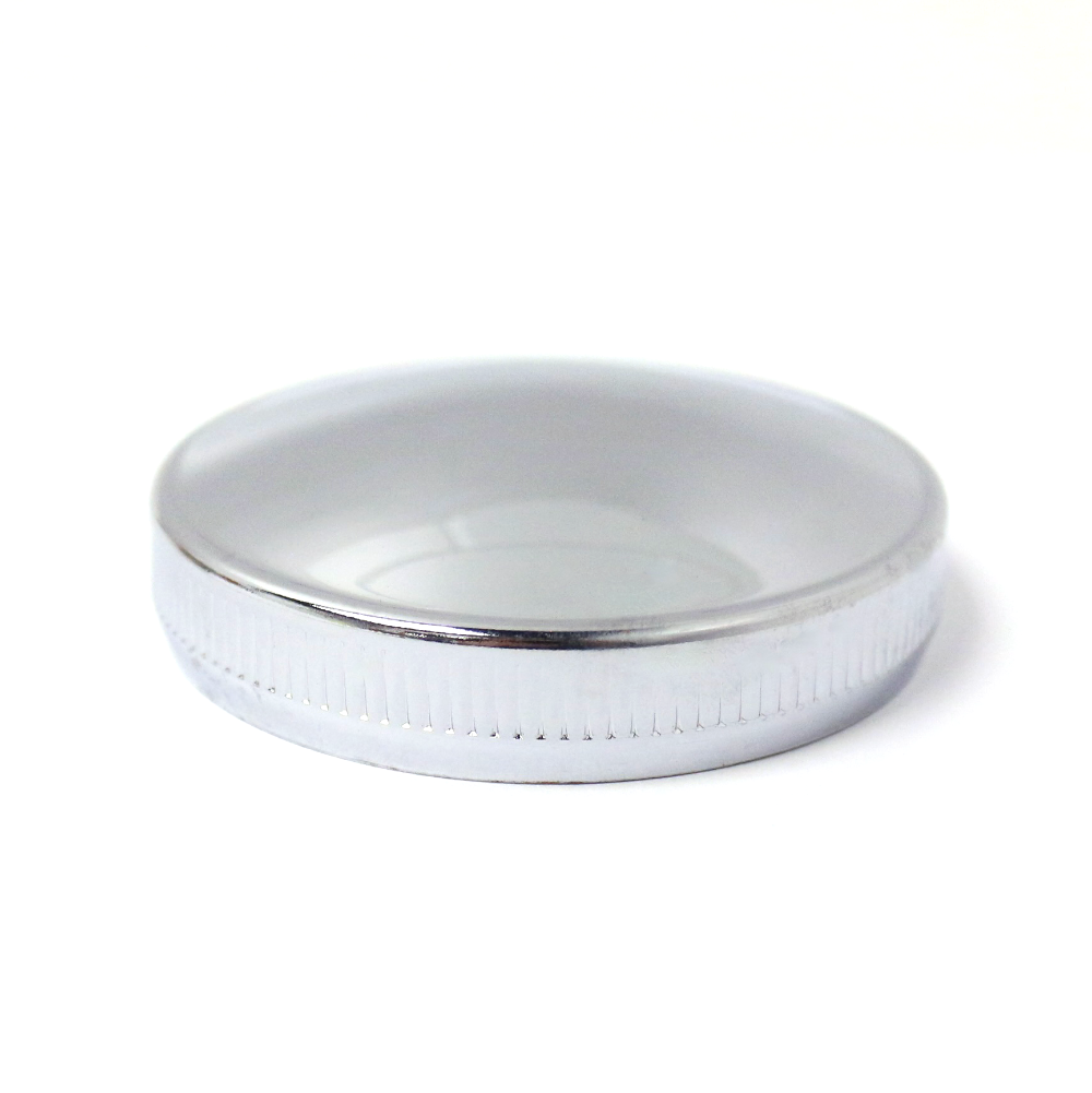 This vented cam or bayonet-style gas cap fits most custom gas tanks and Harley Davidson gas tanks from 1936-1982. On stock Harley motorcycles running two separate fuel tanks, this is the right side gas cap.

Features:

Chrome steel with rubber gasket
Fits custom tanks, or right side tank on stock Harley dual gas tanks