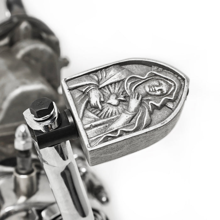 Cast Aluminum Kicker Pedal- Virgin Mary

The Virgin mary kicker pedal features a sturdy heavy cast aluminum construction. It uses a modified standard Harley kicker shaft for serviceability.

Cast aluminum construction

Bolt, shim, and spacer are included
Made in the U.S.A.