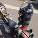 Fuel reserve bottle strapped to sissy bar