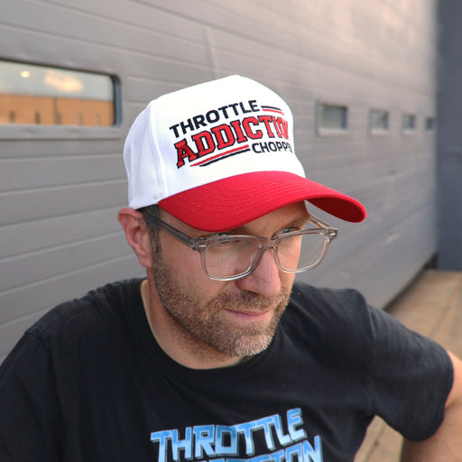 Keep your head styling with this snap-back cap from Throttle Addiction. Classic Trucker Hat.

65/35 polyester/cotton twill
Structured,&nbsp;five-panel, mid-profile
Pre-curved visor
Sewn eyelets
Snapback closure