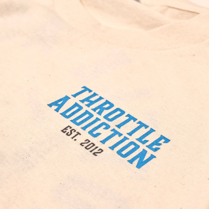 This 100% cotton Natural T-Shirt is printed in Eau Claire WI and features Throttle Addiction Choppers in bright blue and bold black colors. Get yours while quantities last!

Printed in the USA
100% cotton shirt