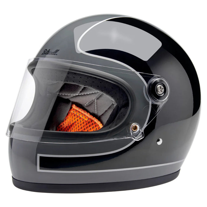 Gray motorcycle helmet with clear visor on a white background