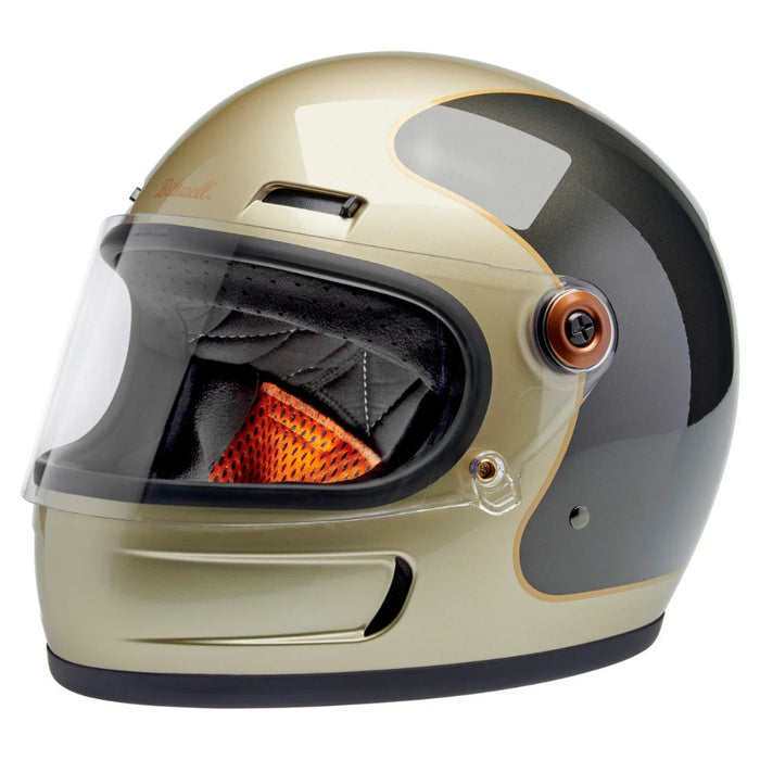 champagne and charcoal motorcycle helmet with clear visor on a white background