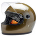 Gold  motorcycle helmet with clear visor on a white background