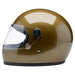 Gold motorcycle helmet with clear visor on a white background