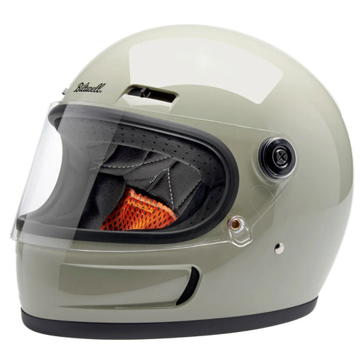 gray motorcycle helmet with clear visor on a white background