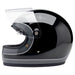 Black and gray motorcycle helmet with clear visor on a white background