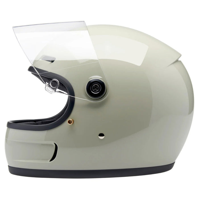 gray motorcycle helmet with clear visor on a white background
