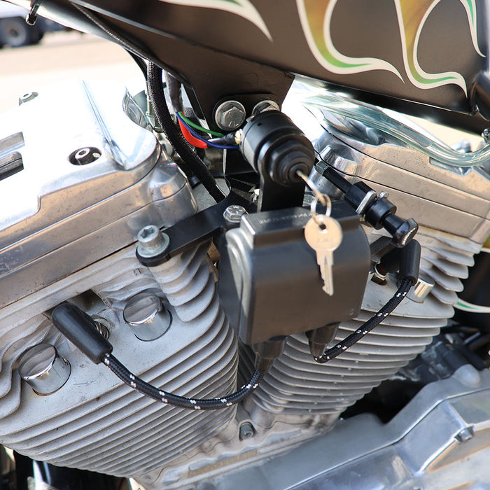 Close-up of a motorcycle ignition switch with key and wiring sportster wiring kit.