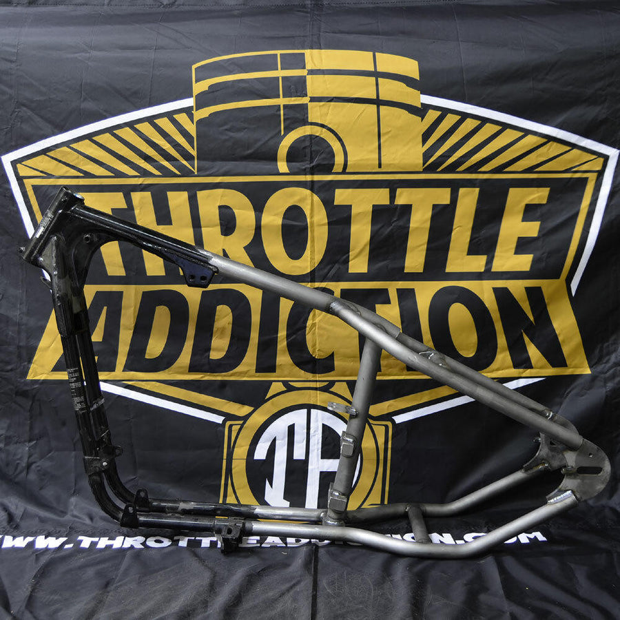 hardtailed sportster frame with throttle addiction logo
